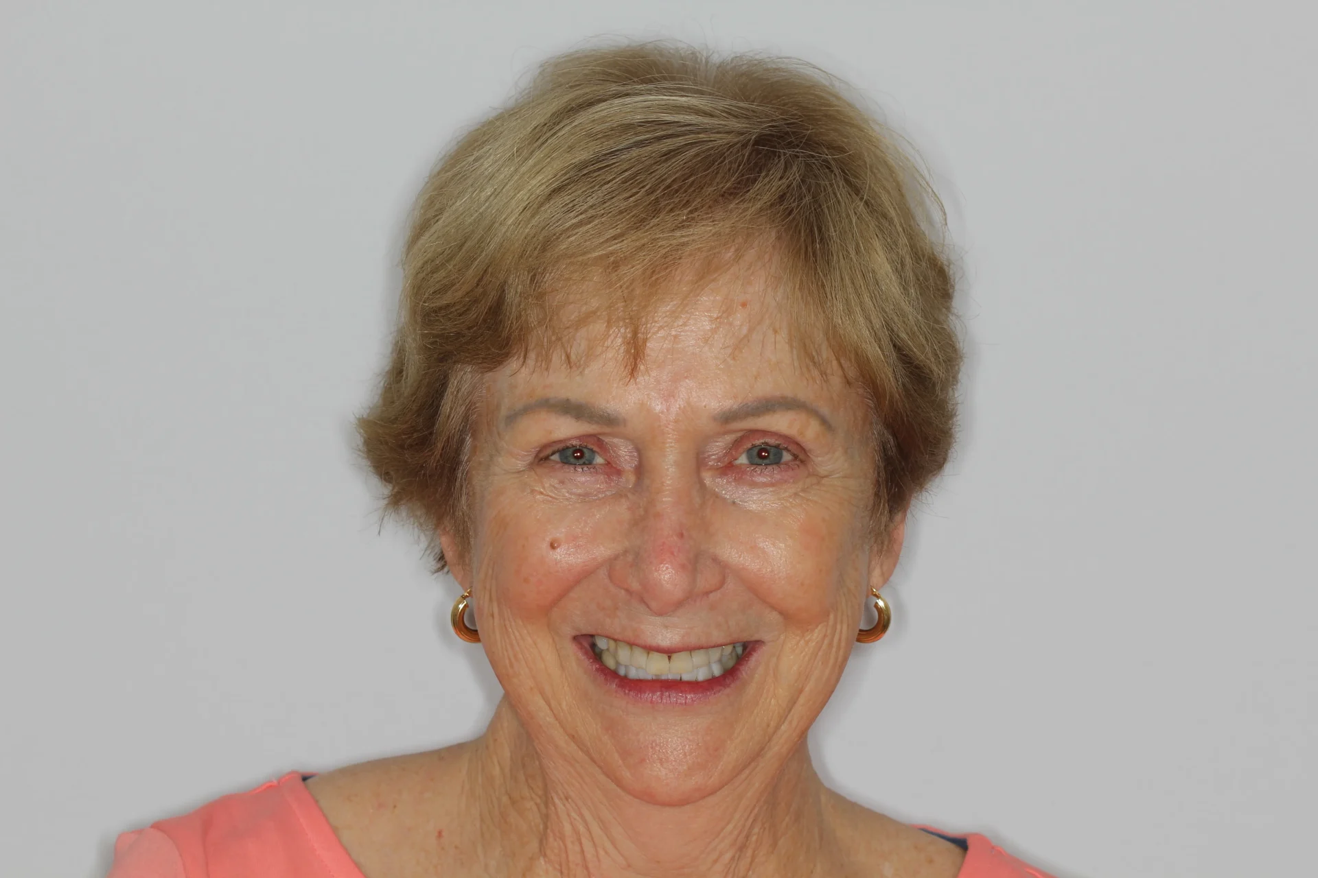 Smiling older woman with short hair