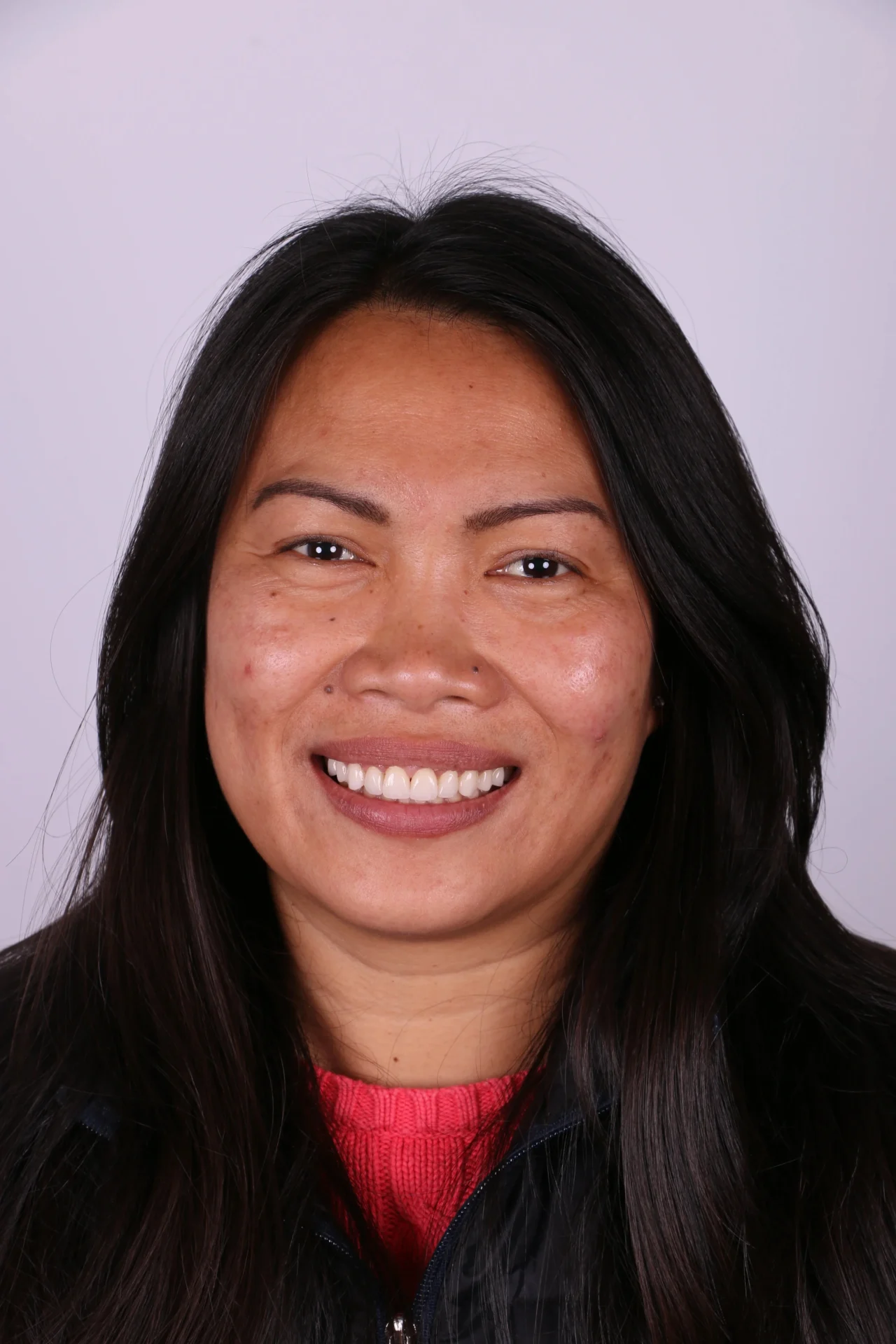 Smiling woman with long black hair 4