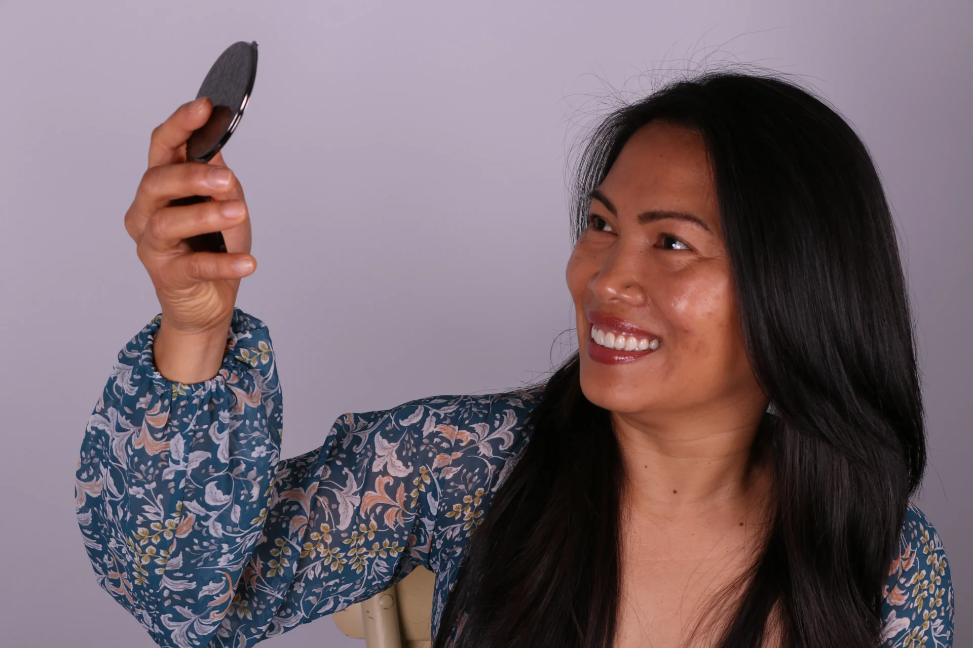 Smiling woman with long black hair 6