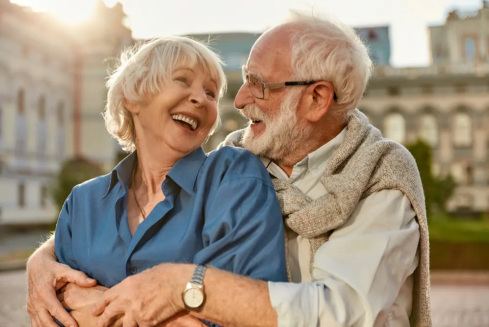 Happy elderly couple enjoying each other