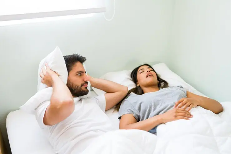 Man disturbed by woman's snoring