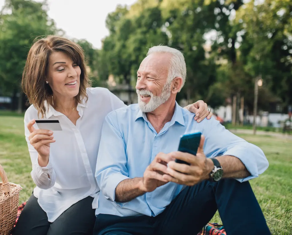 Couple enjoying a picnic together.