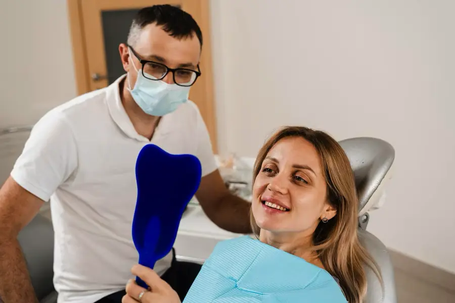 Dentist and patient in dental office